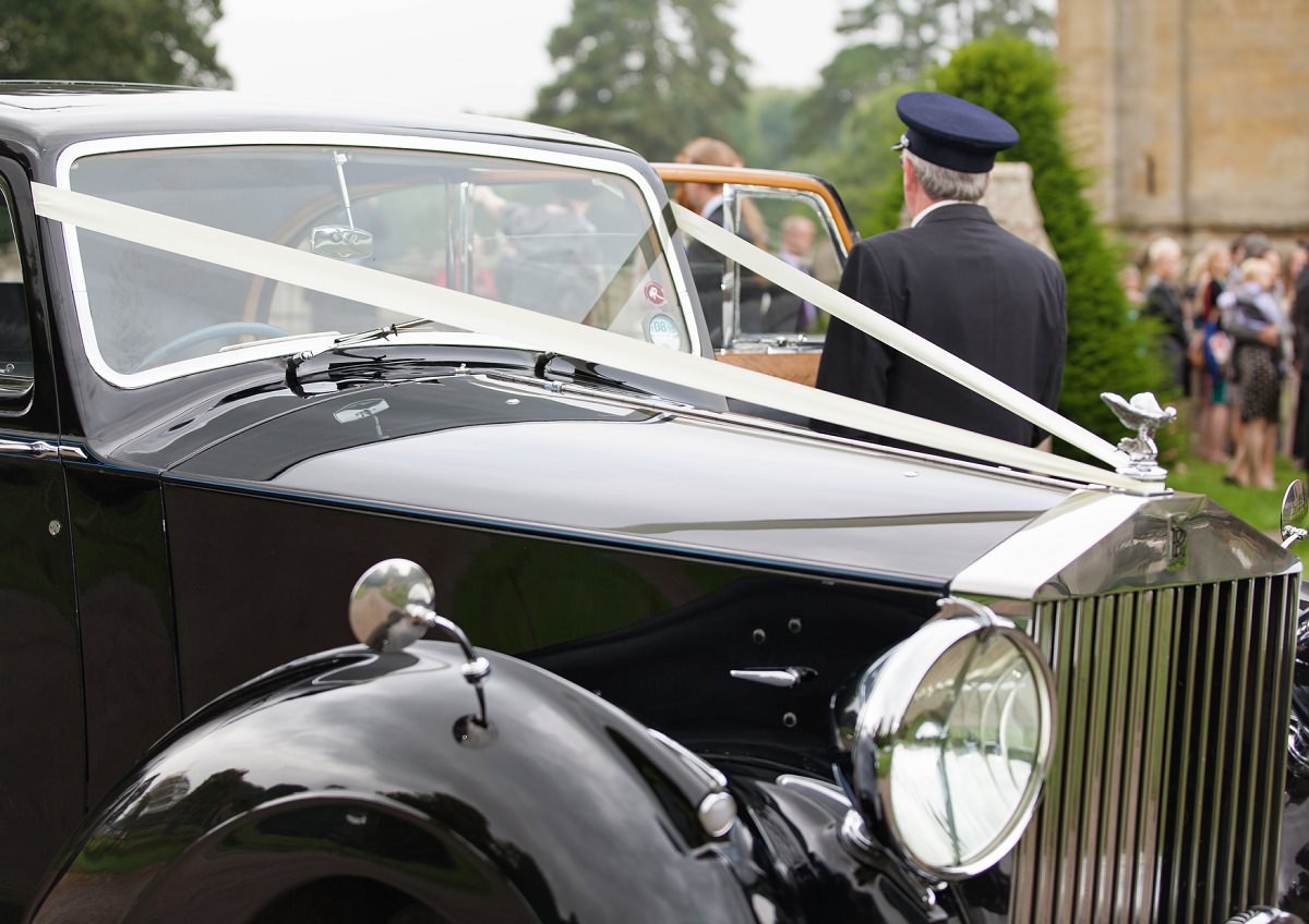 limousine is ready to take the couple to the wedding party