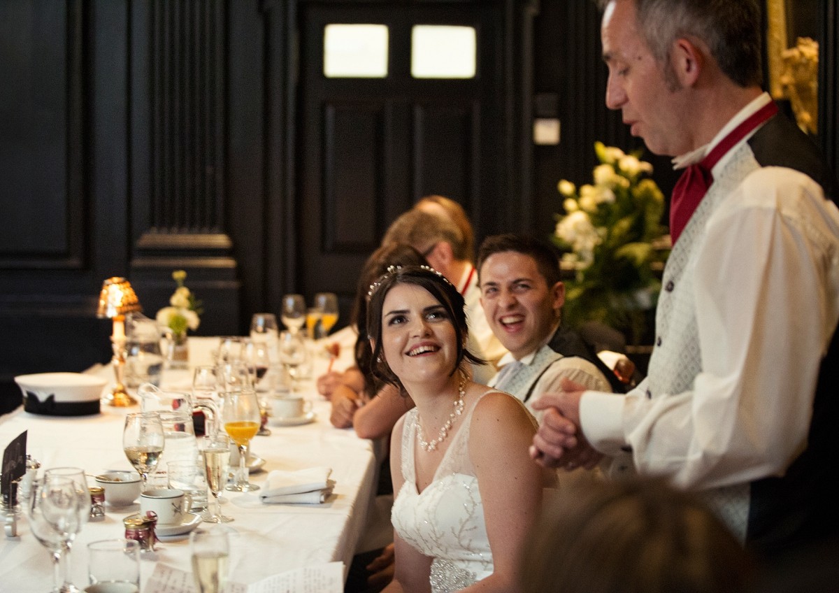 laughing during father's speech