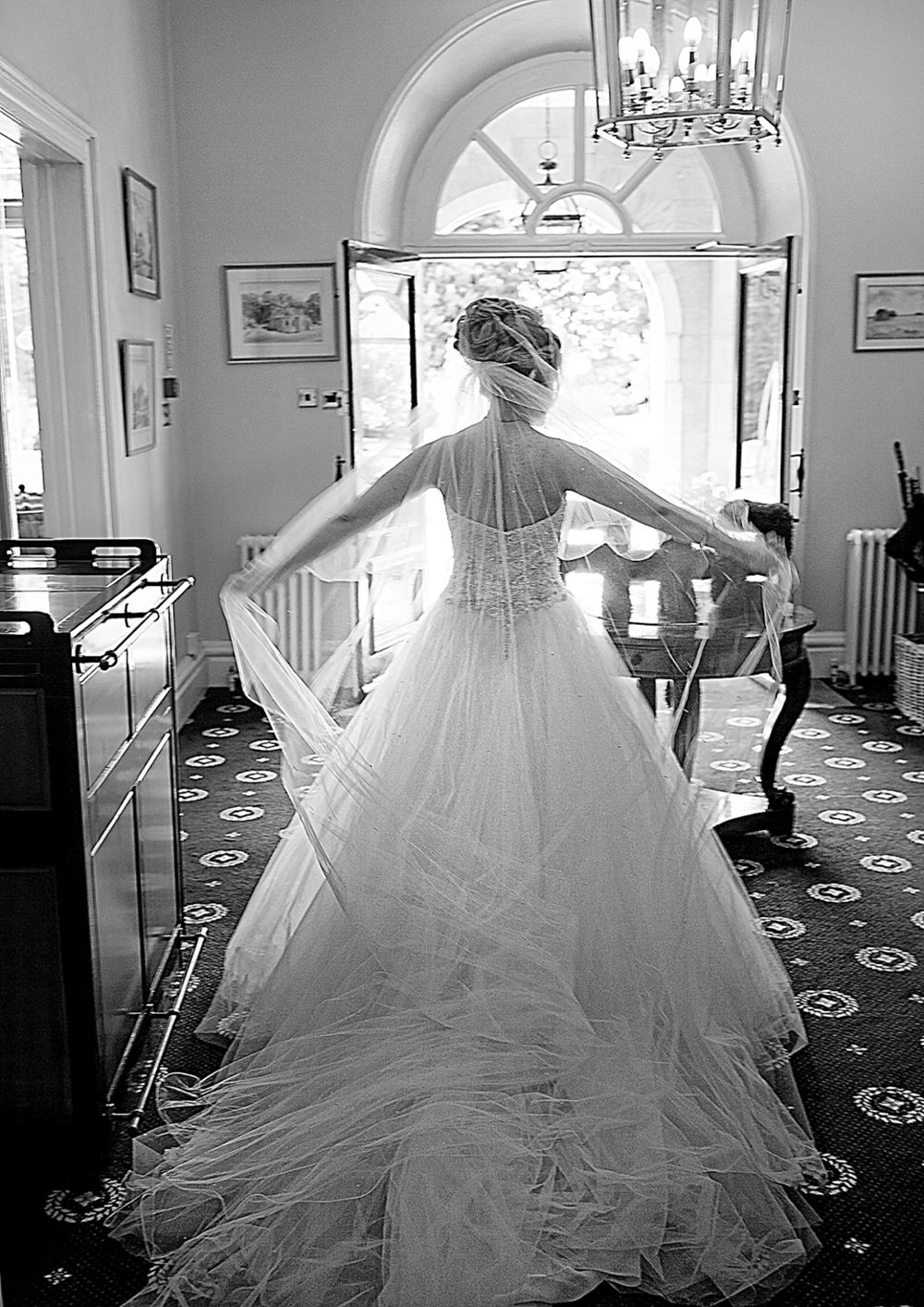 Sara in the corridor of Wadenhoe House