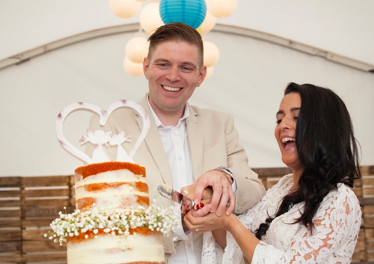 cutting anniversary cake